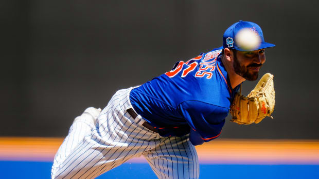 Feb 20, 2023; Port St. Lucie, FL, USA; New York Mets relief pitcher John Curtiss (46) throws a pitch during spring training workouts.